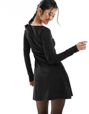 Black Polka Dot Mini Dress with Bow Detail