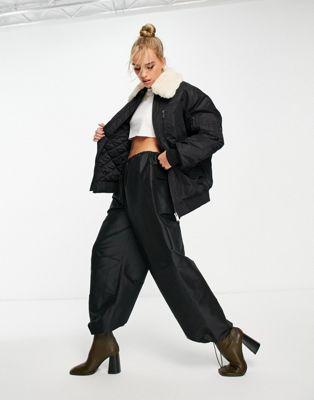 Black Nylon Bomber Jacket with Faux Fur Collar