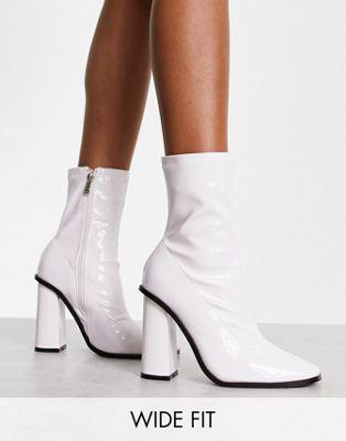 Raid Wide Fit Saylor Block Heel Sock Boots in White Patent