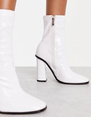 Raid Wide Fit Saylor Block Heel Sock Boots in White Patent