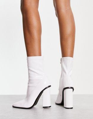 Raid Wide Fit Saylor Block Heel Sock Boots in White Patent