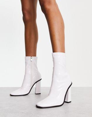 Raid Wide Fit Saylor Block Heel Sock Boots in White Patent